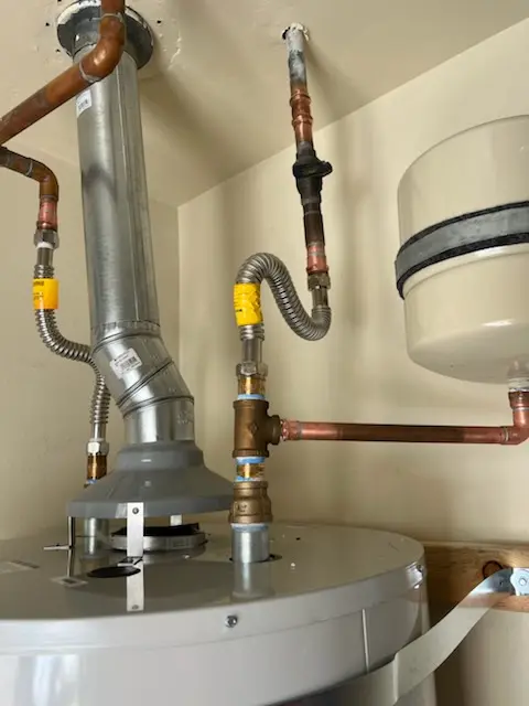 Water heater installation and plumbing repair in Dominion